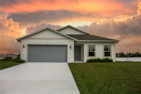 Photo of 449 Grant Boulevard, Lehigh Acres, FL 33974 (MLS # TB8327926)