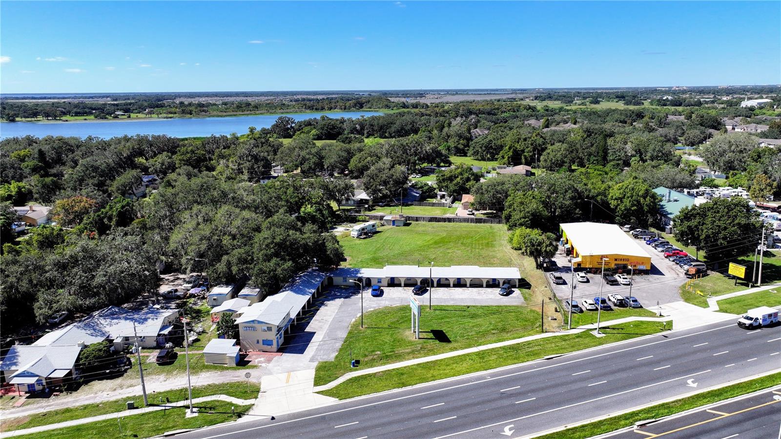 PRICE REDUCED!!! Owner wants offers and is motivated!!!
Location is Paramount and this property has it.
Located directly on E Irlo Bron Highway less that 1/2 mile from the busy Kissimmee Florida Turnpike Interchange.
This area continues to be developed and redeveloed and the possibilities are promising. Currently there are 8 seperate structures that include a single story motel, several stand alone apartments and mobile homes. The income is good but the real value in this property is in the land.
The income producing part of this prooperty lies on the front 1 acre while the 1+ acre in the rear remains vacant juist waiting to be developed.