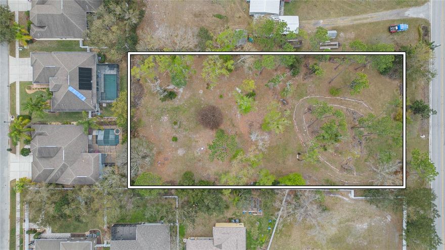 Call your builder and tell them you've found the perfect spot for your new home. This 1.07 ACRE fenced lot has NO HOA RULES OR FEES. Lot is dotted with mature trees and features multiple fruit trees including kumquat and avocado. 150' of frontage on a paved county road. Conveniently located just 25 miles to Tampa International Airport, 13.4 miles to University Of South FL. Premium shopping mall only 8 miles away. Sale includes existing well and septic system (size/condition of well and septic system is unknown and must be verified by the buyer). Currently zoned AR (agriculture residential) which allows mobile homes and farm animals.