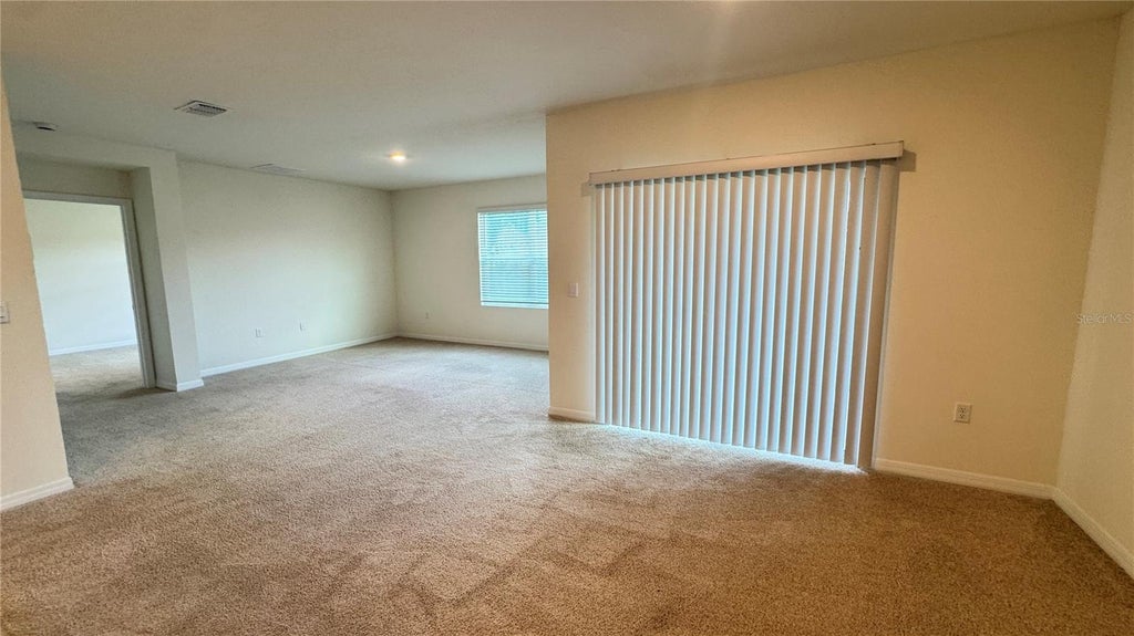 Photo of 939 Stockport Drive, Kissimmee, FL 34758 (MLS # O6443882)