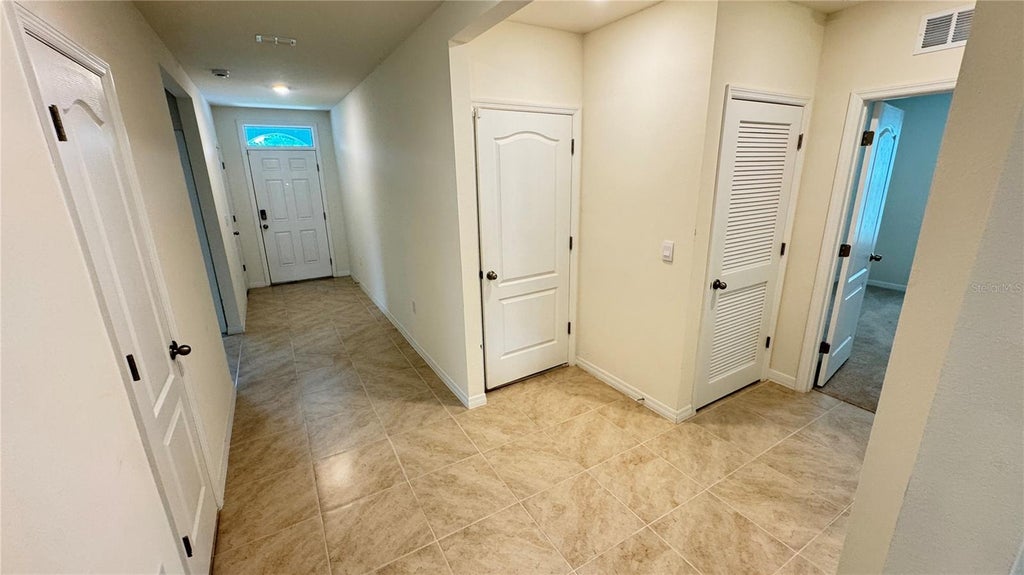 Photo of 939 Stockport Drive, Kissimmee, FL 34758 (MLS # O6443882)
