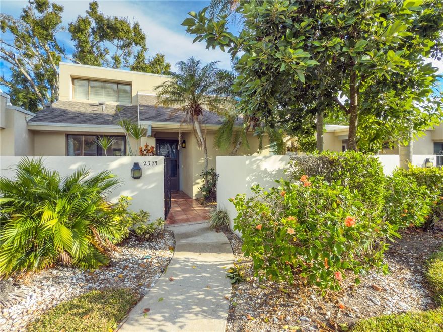 What a deal!! Welcome to the least expensive 3 bedroom property in the Meadows! Located just steps from the golf course, this rare and private three-bedroom, two-bath split-floor plan is nestled in the highly sought-after community of The Meadows of Sarasota, just south of Benderson Park and UTC. Newer roof  in 2023, community pool and access to other great amenities make this community exceptional. Come enjoy living in the most beautiful community for walking and biking paths in Sarasota. This two-story residence offers the convenience of main-level living with all essential amenities, including the laundry room located downstairs, providing an ideal layout for those who prefer fewer stairs while maintaining privacy for guests upstairs. The home features a spacious screened lanai with an extended paver patio out the back sliding glass doors, perfect for outdoor dining or relaxing beneath the shade of a mature oak tree. Constructed of durable concrete block, this villa offers a truly maintenance-free lifestyle, with exterior and yard maintenance handled by the HOA. Residents enjoy close proximity to the community pool and clubhouse, along with access to fitness facilities, social activities, walking and biking trails, green spaces, and optional golf, tennis, and pickleball through country club membership. Conveniently located near downtown Sarasota, UTC shopping and dining, I-75, and Sarasota’s renowned beaches, this 1,560-square-foot property is an exceptional opportunity not to be missed.