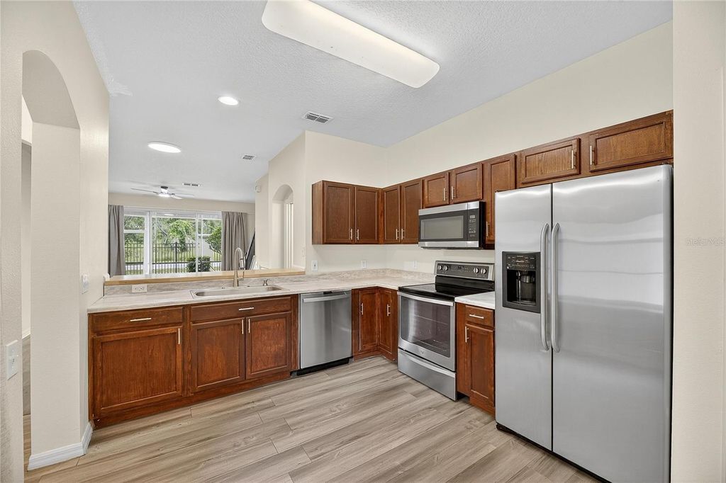 Photo of 9810 Fan Palm Way, Tampa, FL 33610 (MLS # TB8433796)