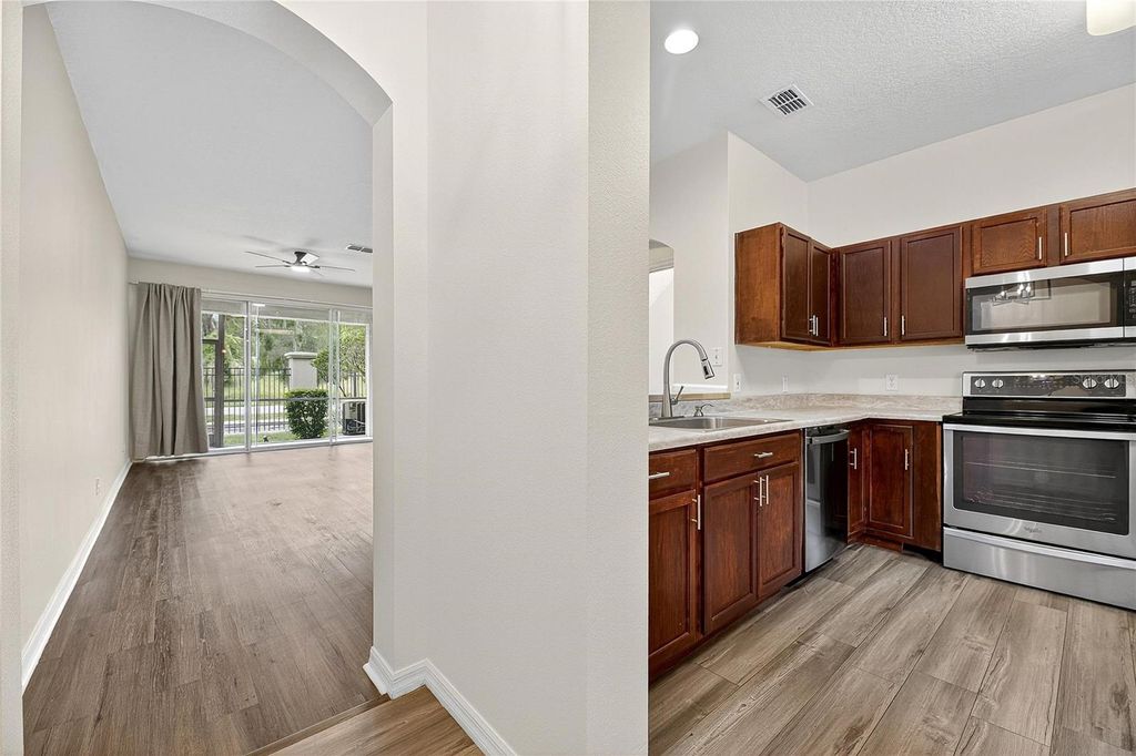 Photo of 9810 Fan Palm Way, Tampa, FL 33610 (MLS # TB8433796)