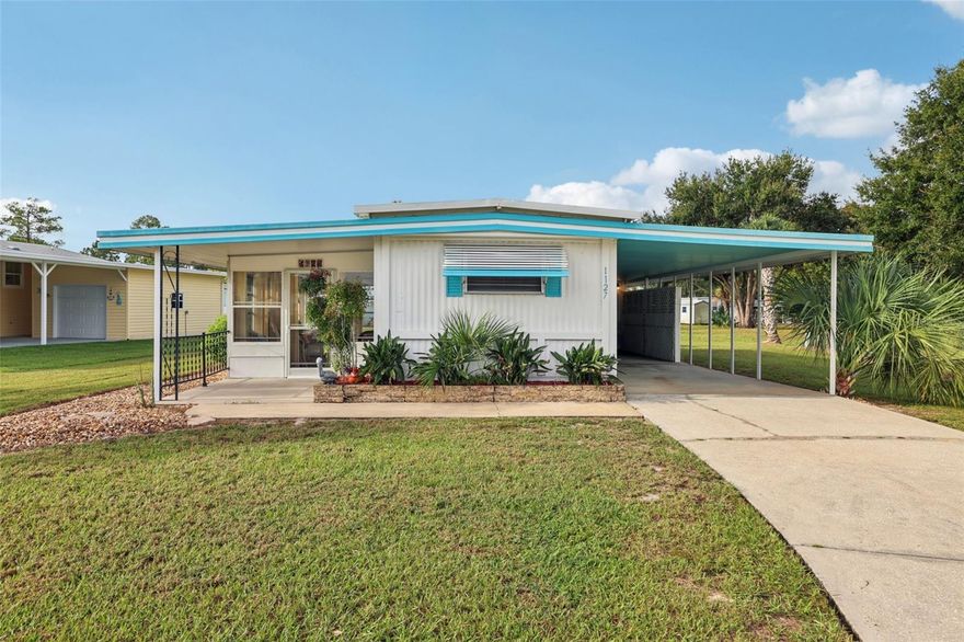 This sweet home is the epitome of Florida living. It is centrally located, with Mount Dora only 6 miles away. Leesburg and The Town of Eustis are both 5 miles away as well. Grocery and drug stores are right up the street, along with Waterman Hospital and Doctor’s Office. Feeling good in the neighborhood is an understatement with a large 55+ community. The Clubhouse has an impressive library and large activity hall. There is an indoor heated pool and an outdoor pool, both of which have more chairs than a small cruise ship. This all overlooks a canal with a small walk-out dock. There is also a marina on the side with boat rentals for enthusiasts that would like to sail on the canal and out to the lake. This sweet home has new sub flooring and luxury vinyl flooring.  The roof is metal and in great condition. The gutters and drain pipes are all undated. The kitchen has new appliances and an open floor plan allowing for great conversation. The Florida room and front patio allow for enjoyment no matter what the weather. The windows are large and inviting.