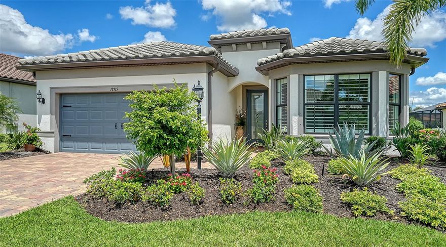 Welcome to this beautifully maintained 2-bedroom + den, 2-bathroom home in the highly sought-after Del Webb community. This popular Mystique model offers a spacious open-concept design, featuring a large great room, a stylish island kitchen, and a formal dining area ideal for entertaining. Corner sliders open to an oversized lanai, seamlessly extending your living space to the outdoors and providing a peaceful spot to relax. The property boasts a newly landscaped, fenced-in yard—perfect for pets—along with partial lake views that add a tranquil touch. Inside, the versatile den/flex space, secondary bedroom, and full bathroom are thoughtfully laid out for both functionality and comfort. The well-appointed laundry area adds convenience. The primary suite is a true retreat, featuring a large walk-in shower, double vanity, and an expansive walk-in closet. High-end finishes throughout, including porcelain tile floors, custom cabinetry, and solid surface countertops, create a modern, elegant atmosphere. For added peace of mind, the home is equipped with hurricane shutters, offering protection during storm season. Situated in the vibrant Del Webb community, this home provides access to an extensive amenity center, clubhouse, tennis and pickleball courts, a pool, fitness center, and more. Located within the award-winning Lakewood Ranch, enjoy easy access to Main Street and Waterside with their exceptional restaurants, shops, and weekly market. Move-in ready and offering the perfect blend of comfort, style, and location—this gem is not to be missed!