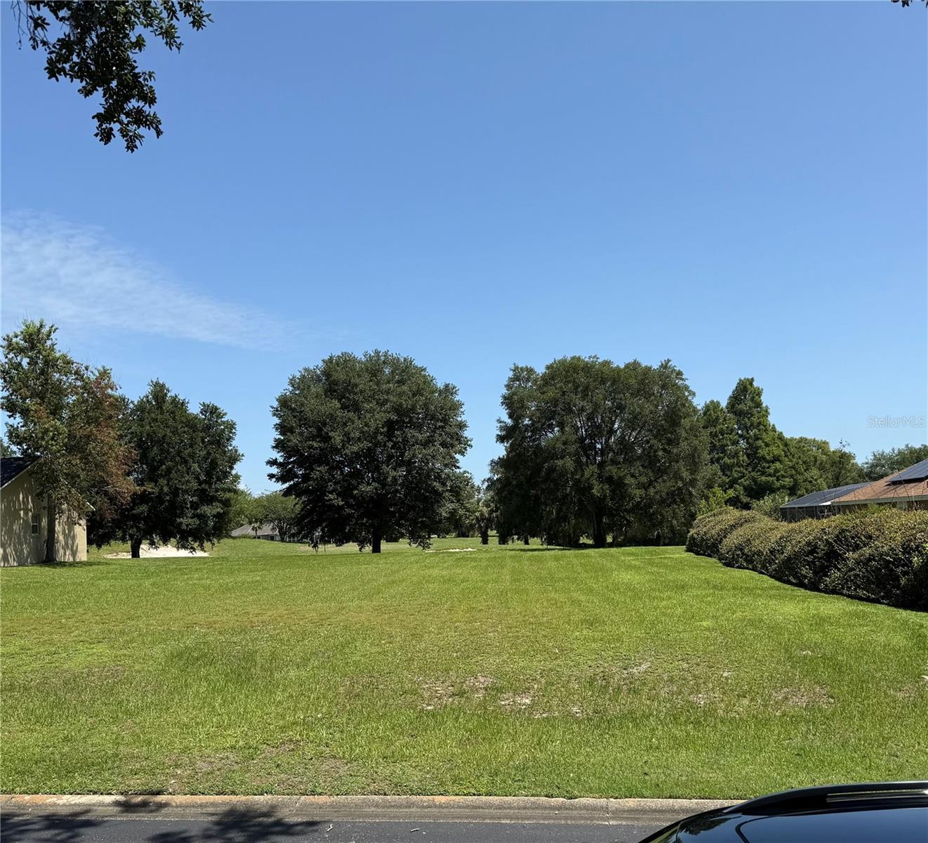 Golf Front Paradise adjacent to the Village. Build Your Dream Home! Discover the perfect blend of relaxation and recreation with this cleared, ready-to-build lot located just steps from the fairway in a quiet, established neighborhood. Nestled near Spanish Springs Town Center, this prime property offers convenient access to golf, shopping, and dining.
Enjoy the peaceful atmosphere of a golf course community that offers an 18-hole executive course with elevation changes, water features, and challenging putting greens. Whether you're looking to build your forever home or a seasonal retreat, this lot offers an unbeatable location with easy connections to Ocala, The Villages amenities, and Orlando.
Don't miss your chance to create a custom home on the golf course — the Florida lifestyle awaits!