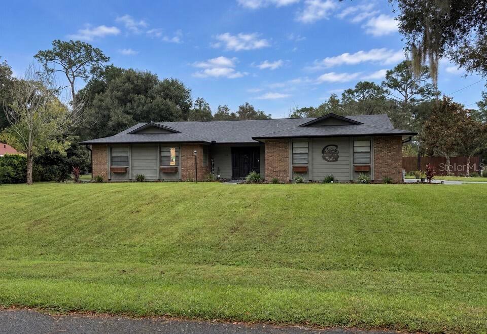 Photo of 804 Lake Drive, Deland, FL 32724 (MLS # O6450887)