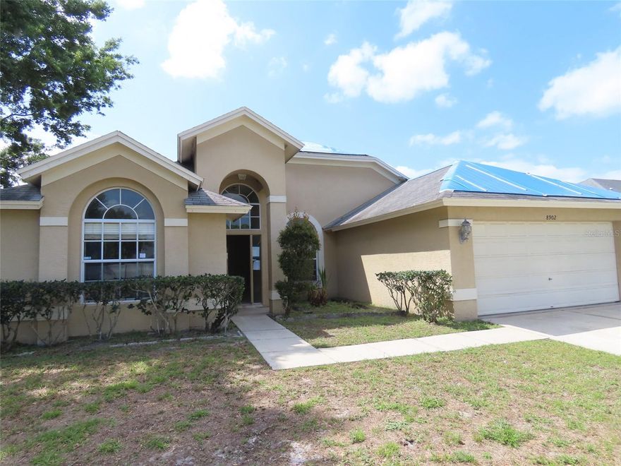 Opportunity and potential come together on this spacious corner lot in Tampa—this 4-bedroom, 2-bath home with a 2-car garage offers a versatile layout ready for updates, customization, or investment. Featuring a split bedroom floor plan, the home includes a living room and dining room combination along with a kitchen that offers a breakfast nook for casual dining. Just off the kitchen is a flexible bonus room, ideal for a home office, game room, craft space, or additional living area depending on your needs.
The home features a mix of tile and laminate flooring throughout, providing a solid starting point for future improvements. A screened lanai extends the living space outdoors, offering a covered area to relax or entertain while overlooking the fenced yard. Positioned on a corner lot, the property allows for added outdoor flexibility, whether enhancing landscaping, creating entertaining areas, or reimagining the exterior space.
While the home does require work and is not move-in ready, it presents a strong opportunity to create value in the Tampa area. Property is ducted for central air, but components are missing. Water heater is also missing. The existing layout, additional bonus space, and lot configuration provide a foundation for a variety of possibilities.
Conveniently located approximately 15–18 miles from Downtown Tampa and about 10–12 miles from Tampa International Airport, the property offers access to major employment centers, the Tampa Riverwalk, the Westshore Business District, and a wide range of dining, shopping, and entertainment options. Nearby parks and recreational amenities further contribute to the appeal of the surrounding area.
This property offers an opportunity to create something special in a location with convenient access to key areas throughout the Tampa Bay region.
All information is believed to be accurate but is not guaranteed. Buyers and agents to verify all facts and information pertinent to their purchase decision.
