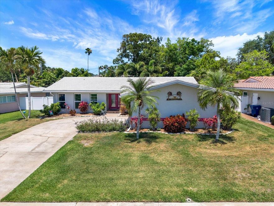 Welcome home to this meticulously maintained sanctuary in the resort-style community of Imperial Point. Upon entry, you are greeted by an expansive open-concept floor plan where the large living and dining spaces flow effortlessly together, underscored by seamless tile flooring and bathed in abundant natural light from hurricane impact windows and doors (installed 2022).  The home’s architectural highlight is the set of disappearing pocket sliding glass doors that recede entirely into the wall, creating a breathtaking, unobstructed transition to the screened-in patio and pool—now featuring a brand-new pool pump (2025). This residence is designed for flexible luxury, featuring two primary suites with private ensuites and direct pool access. A third bedroom offers generous space with a walk-in closet, while the guest bathroom is conveniently equipped with a full tub. Additionally, a front fourth bedroom with double glass doors serves as the perfect sophisticated home office.  The gourmet kitchen serves as the heart of the home, boasting sleek granite countertops, exhaustive storage, and a reverse osmosis system. This home offers ultimate peace of mind with a long lasting tile roof (2006), plus a water softener and water heater replaced in 2024.  Practicality meets polish with an indoor laundry room and a pristine 2-car garage finished with professional MotorDeck flooring—ideal for a private home gym. Beyond your front door, life in paradise includes access to premier community amenities: a heated pool overlooking the intracoastal, a private boat ramp, fishing dock, tennis and pickleball courts, and a full-service clubhouse complete with a gym, game room, and library. Do not miss your chance to own this rare, move-in-ready pool home in one of the area's most coveted coastal communities.