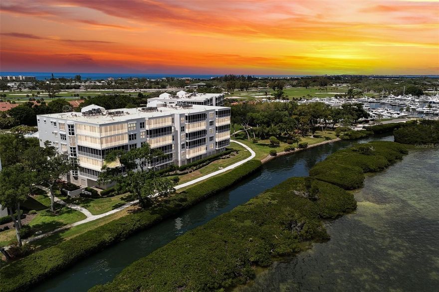 Welcome to Marina Bay – the premier condominium within the gated Bay Isles Community on Longboat Key. This exceptional corner residence spans 3,578 sq ft of sunlit, sophisticated living, and shares it fourth floor lobby with only one other unit. The large, updated kitchen/dining room features extra-large windows allowing for an unobstructed view of Sarasota Bay. Exquisite floor-to-ceiling windows, in the oversized living room, frame sweeping panoramic vistas of Sarasota Bay and downtown Sarasota, while the unusually large balcony provides the perfect setting for morning coffee, evening relaxation, and observing abundant bird and marine life. A second, west-facing balcony delivers spectacular Gulf sunsets, offering the rare pleasure of both sunrise and sunset living. Marina Bay is the epitome of resort-style living, with a heated pool and spa, newly renovated tennis and pickleball courts, and well-appointed fitness room. Head to the adjacent marina or around the manicured Longboat Key Club Harbourside Golf Course. Ideally situated, this residence is in close proximity to Publix, CVS, Chase Bank, and local shops. Whether as a refined full-time residence or an elevated part-time retreat, this rare offering delivers unmatched luxury, convenience, and island living. Key Features include: Corner-end unit with 3 bedrooms and 3 ½ newly renovated baths, A walk-in double shower in main suite, New floor tile on oversized screened balcony, bathrooms, and main suite floors, Equipped with storm shutters, and access to private beach for Bay Isles residents only.
