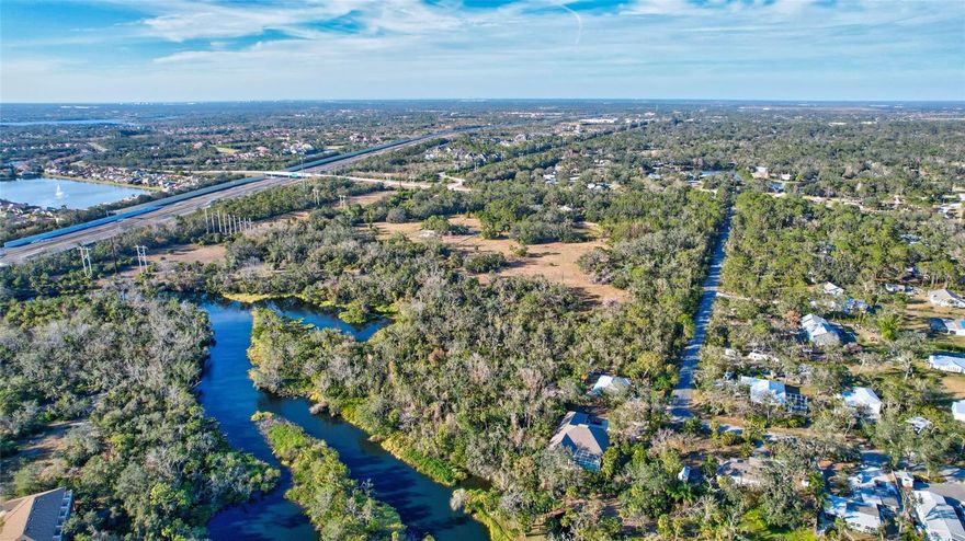 Under contract-accepting backup offers. INVESTORS!!! Prime property for development, the only one of this size at Lakewood Ranch!. 2 parcels totalling 25.78 acres, 615ft direct access to the Braden River. Centrally located between SR-70 and University Pkwy with quick access to I-75. High and Dry. Property is fenced. This is an amazing investment opportunity. Smaller parcel (2.08 acres) tax number 19034-0065-1 allows you to build a second entrance to development.