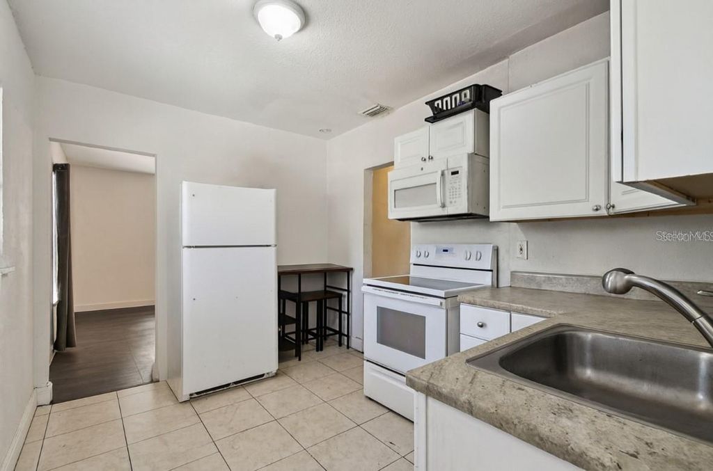 Photo of 725 21st Avenue S, St Petersburg, FL 33705 (MLS # TB8431954)