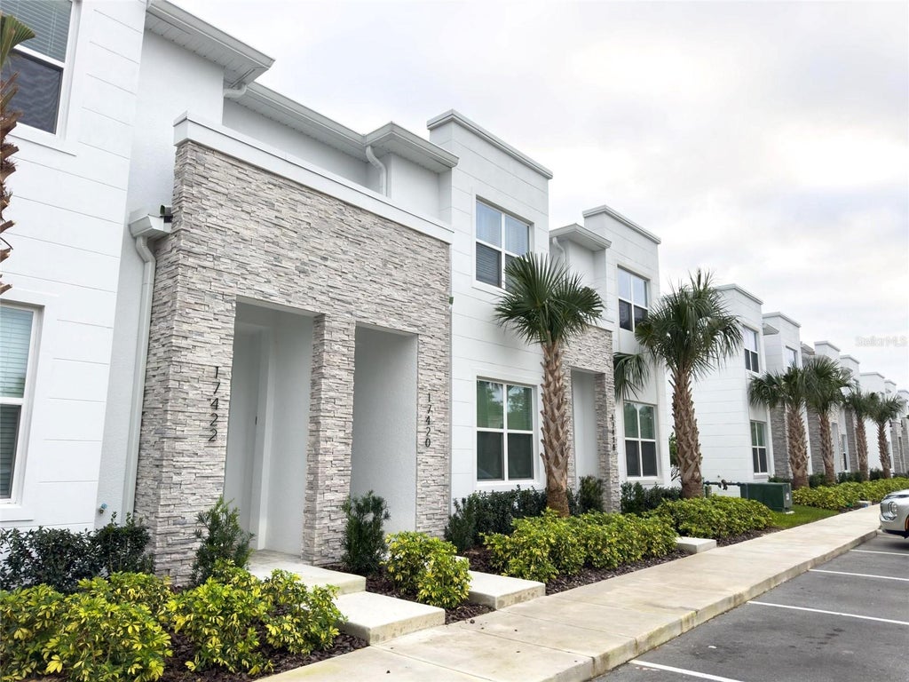 Photo of 17422 Serenidad Boulevard, Clermont, FL 34714 (MLS # O6414973)