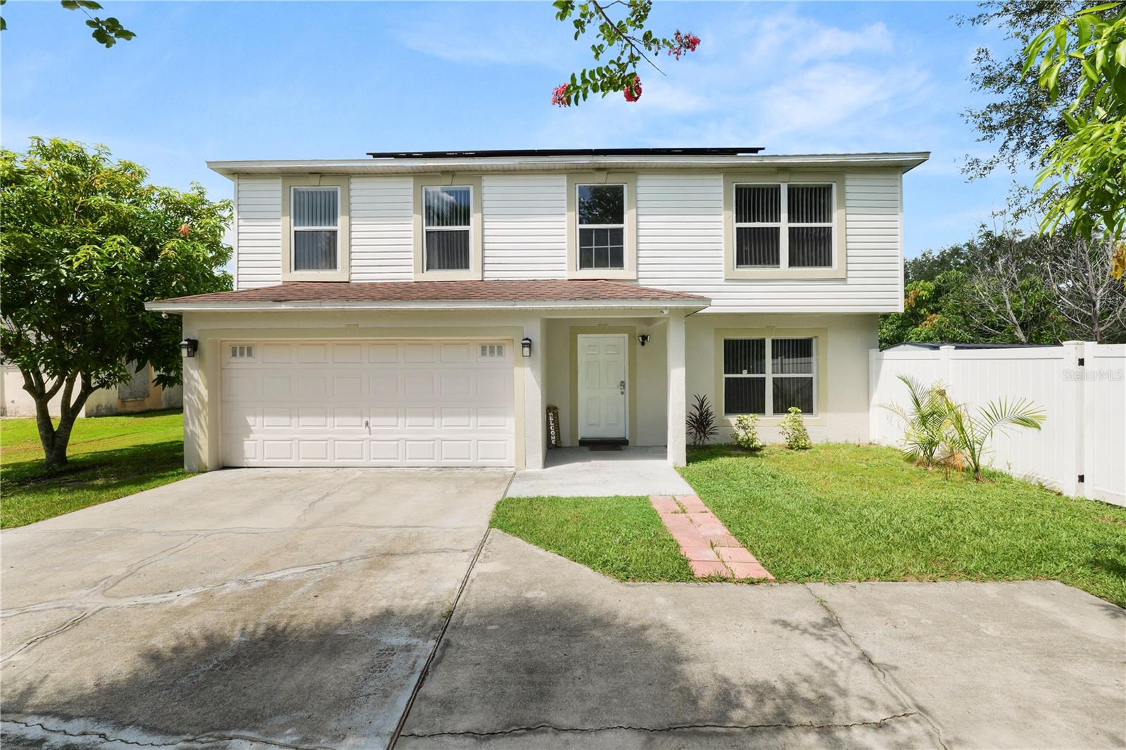 Take a look at this 4 bedroom 2.5 bathroom home located conveniently with easy access to dining, shopping and major roadways. The roof was replaced in 2023 along with new exterior paint. Entering the home you’ll find tile flooring and a large living room/dining room combo with plenty of natural light. You’ll find sliding doors leading to your fully fenced backyard featuring an above ground pool and outdoor storage shed. The large kitchen features an island, NEW stainless steel appliances, and a pantry, along with a window above the sink overlooking the backyard. You’ll find a half bath downstairs for guests. Upstairs, you’ll find all four bedrooms. The primary bedroom is spacious and has plenty of natural light. The ensuite features a single sink vanity with an extended countertop, a tub/shower combo and a large closet. The remaining bedrooms provide plenty of space and share the hall bathroom with a single sink vanity and tub/shower combo. Carpet and an AC unit has been added to the garage. The home also offers an indoor laundry room and solar panels for increased energy efficiency. Additionally, the home sits on a flag lot giving an extra long driveway with plenty of parking! Schedule your private showing today and see everything this home has to offer!