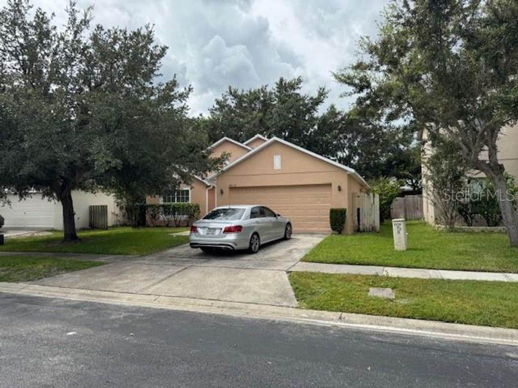Photo of 4618 Aguila Place, Orlando, FL 32826 (MLS # O6382507)
