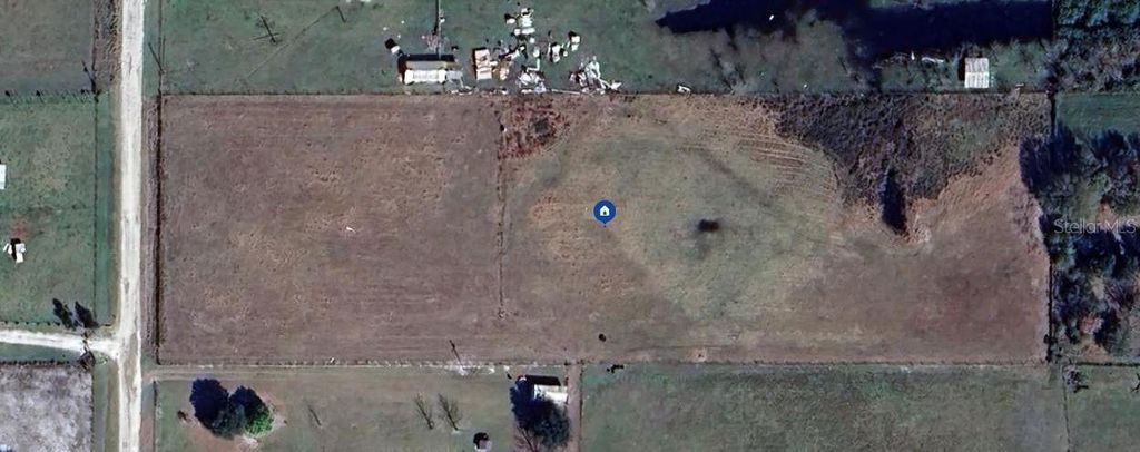 Photo of 52 Meadow Way, Frostproof, FL 33843 (MLS # O6204204)