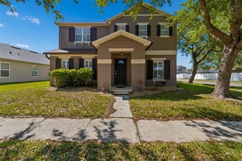 Photo of 14759 Royal Poinciana Drive, Orlando, FL 32828 (MLS # O6371525)