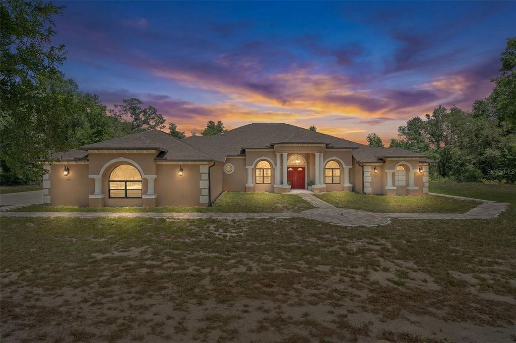 Photo of 222 Suncoast Boulevard, Spring Hill, FL 34608 (MLS # TB8516840)