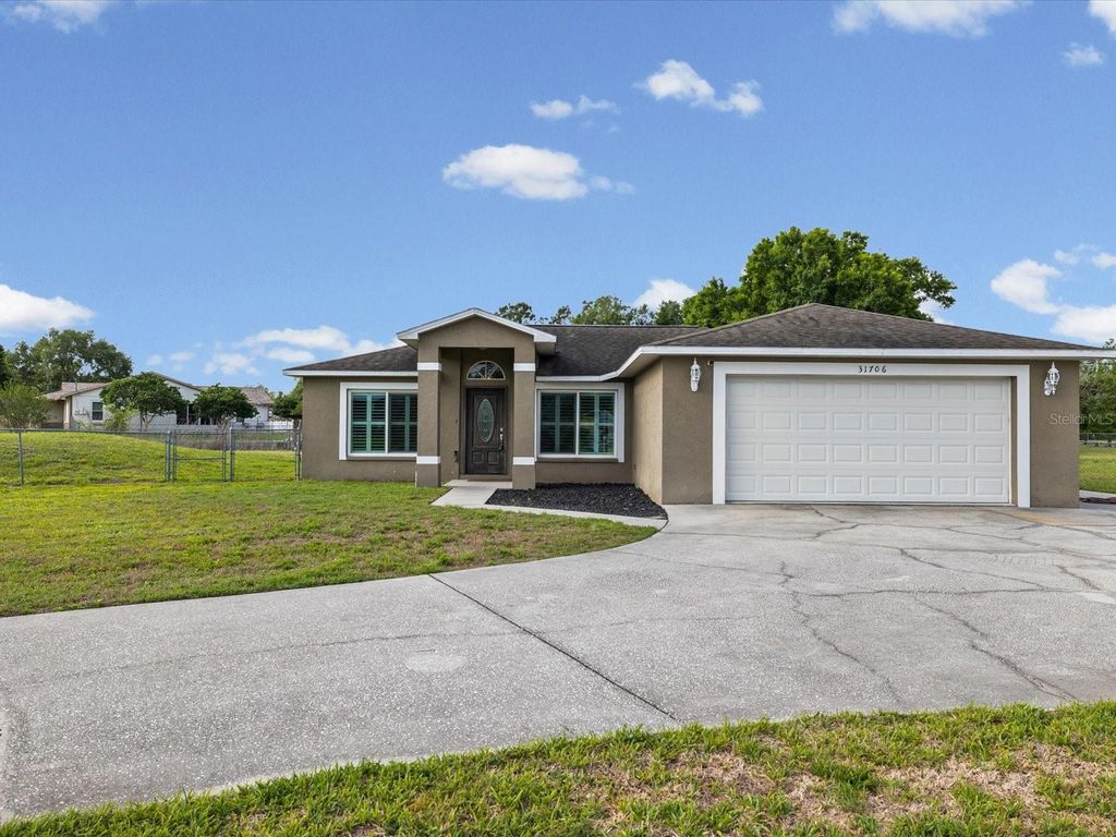 Photo of 31706 Hunt Club Lane, Wesley Chapel, FL 33543 (MLS # TB8495997)