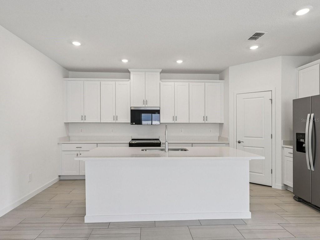 Photo of 71 Ararat Drive, Palm Coast, FL 32137 (MLS # TB8498368)