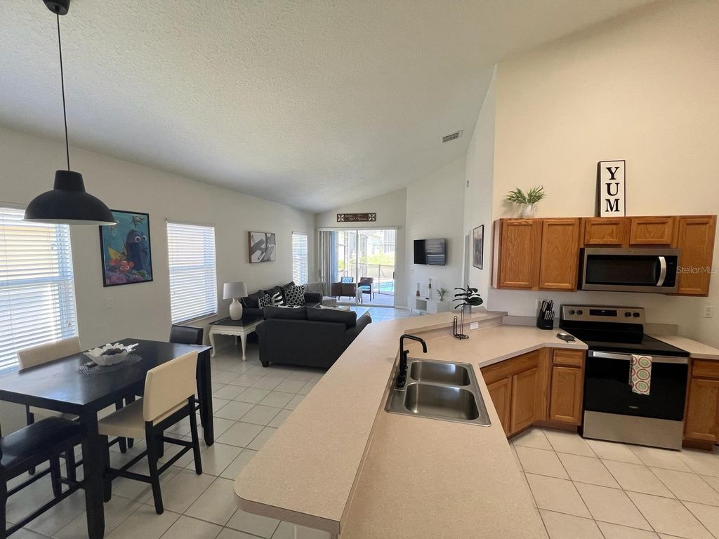 Photo of 116 Corvina Drive, Davenport, FL 33897 (MLS # P4938026)