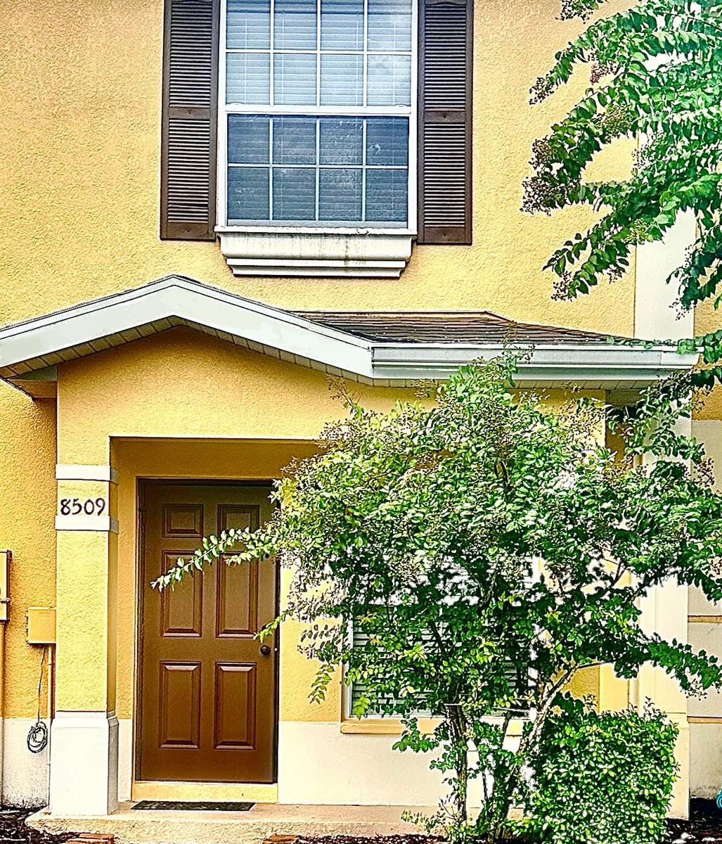 Move-in Ready Townhome in Gated Hammocks Community. This spotless clean townhouse features 2 bedrooms, 2 full bathrooms, 1 half bathroom, and a spacious lot behind. Each bedroom features its own private bathroom and closet for maximum comfort. The home has been thoughtfully updated with freshly painted walls, brand-new flooring on the main level, a new washer, and a new refrigerator, making it completely move-in ready. The stairs, the second floor, and bedrooms are finished with cozy carpeting, adding warmth throughout. Enjoy the spacious lot behind the townhouse—perfect for outdoor relaxation or entertaining. The community also offers fantastic amenities, including a resort-style pool, onsite fitness center, and gated entry for added security and peace of mind. Prime New Tampa Location: Minutes from Wiregrass Mall, Tampa Premium Outlets, USF, excellent schools, top-rated hospitals, and endless dining & entertainment options. Just 2 miles from I-75 and I-275, providing an easy commute anywhere in the Tampa Bay area. Don’t miss your chance to own this beautifully updated 2-bedroom, 2.5-bathroom townhome in the highly desirable Hammocks community!