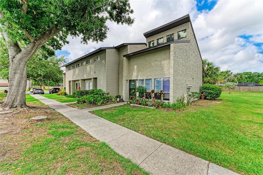 EXCELLENT LOCATION near University Parkway - just minutes from shopping and dozens of restaurants. This townhouse features a unique cathedral ceiling floor plan with a loft, outdoor screened lanai, upstairs balcony, celing fans, and a spacious walk in closet and laundry room. This spotless end unit was recently painted and it has new carpeting and nearly new stainless steel appliances.
The townhouse is priced to sell and is just steps away from the condominium amenities including the large outdoor pool, tennis court and club house.  University Town Center area is only minutes away; Walmart and Publix are a few blocks away. The property also offers quick access to downtown Sarasota, Bradenton and interstate 75. The reasonable association fee includes cable and WIFI!  Great opportunity for a young professional, first-time buyer, retiree or snowbird!  Note:  Must own 2 years before unit may be leased, with a minimum lease period of 6 months and one day.  HOA approval required. Dogs/Cats OK up to 20 lb