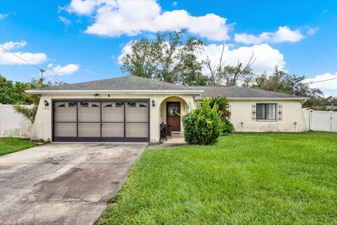 Photo of 14260 Spring Hill Drive, Spring Hill, FL 34609 (MLS # W7889319)