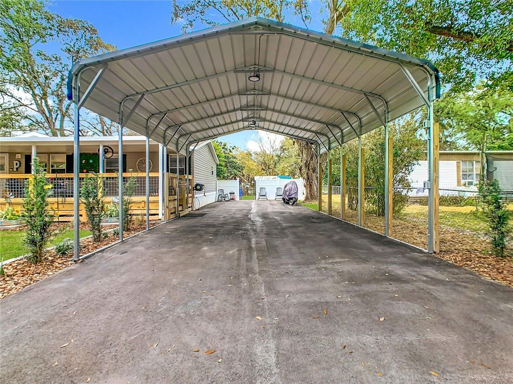 Photo of 214 Grove Ridge Drive, Winter Haven, FL 33880 (MLS # O6382247)