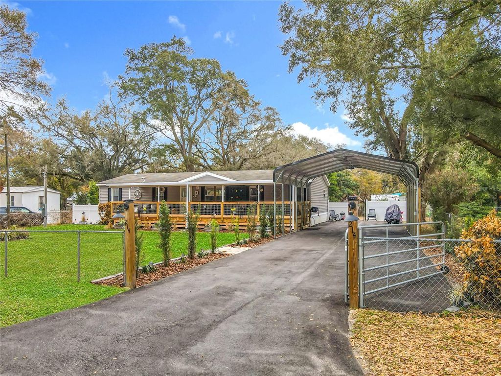 Photo of 214 Grove Ridge Drive, Winter Haven, FL 33880 (MLS # O6382247)