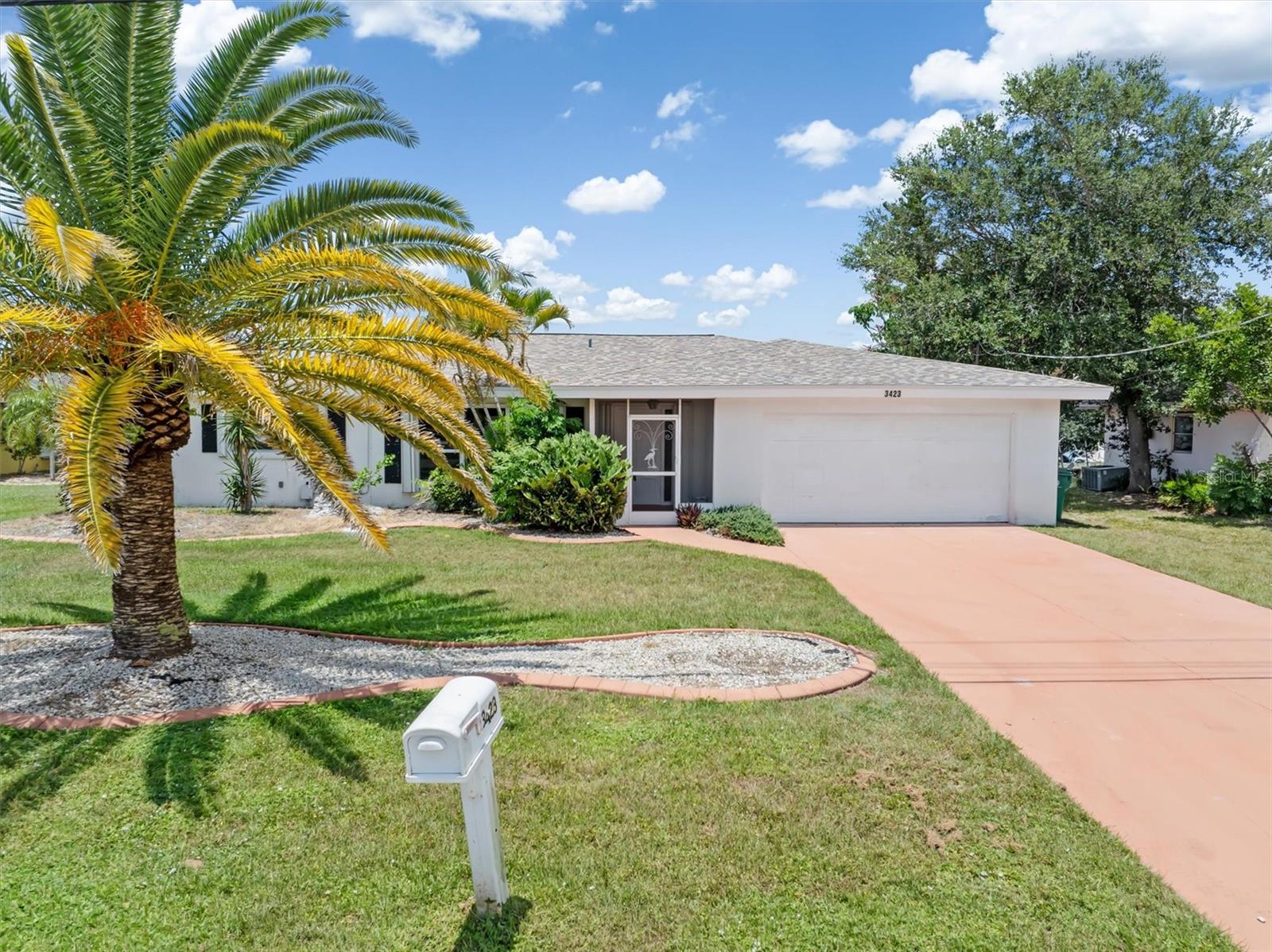 Charlotte Harbor Oasis: Spacious 3/2/2 Pool Home on Freshwater Canal - Your Opportunity Awaits!
Discover your dream Florida lifestyle in this expansive 1800+sq ft, 3-bedroom, 2-bathroom, 2-car garage pool home, situated in the heart of desirable Charlotte Harbor! Featuring ample living space, this split floorplan features both a welcoming great room and a comfortable family room, providing plenty of space for privacy, relaxation and entertaining.
The heart of the home, the kitchen, has cherry wood cabinets, sleek granite countertops, and modern stainless-steel appliances, making meal prep a joy. While the bathrooms are ready for your personal touch, a fresh coat of paint inside and out will truly make this house your own. 2018 shingle roof and 2024 HVAC will ensure your peace of mind plus hurricane shutters are included!
Step outside to enjoy your private paradise! A large, screened lanai overlooks the sparkling pool and spa, offering the ideal spot for al fresco dining, entertaining, or simply unwinding while enjoying the serene views of the freshwater canal. This canal-front location is a true nature lover's delight, perfect for fishing, kayaking, and canoeing right from your backyard. Nice curbing outlines the landscaping. Choose some fresh plantings and enjoy creating your garden!
Convenience is key! You'll love being close to everything Charlotte Harbor has to offer, including a myriad of shopping options, top-rated schools, essential medical offices and hospitals, and an array of fantastic restaurants.
This is an incredible opportunity for a first-time home buyer, a retiree seeking a great value, or an astute investor! A little sweat equity will make this home truly shine! Don't miss your chance to own a piece of paradise in a vibrant and accessible location!