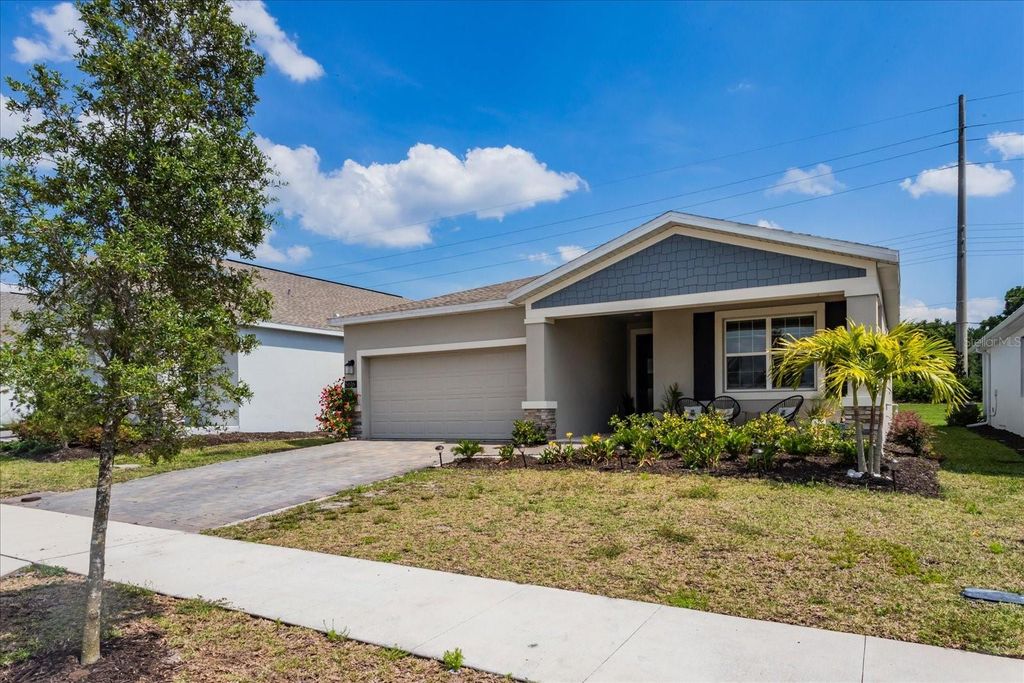 Photo of 5616 Quiet Palm Loop, Saint Cloud, FL 34771 (MLS # O6404807)