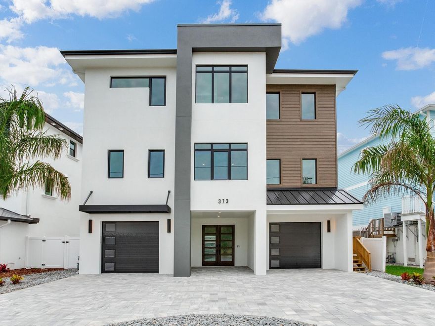 Pre-Construction. To be built. Pre-Construction! Welcome to your future COASTAL SANCTUARY—where timeless design, uncompromising construction, and refined Coastal Luxury meet. This *TO BE BUILT* residence by Aventis Homes (formerly known as LUBKE) will stand proudly along the Intracoastal Waterway in Redington Beach, offering the perfect balance of serene waterfront living and masterfully engineered strength with 4 Beds| 4 Baths | 4,000 Sq ft. A Boater’s Dream with direct access to the Intracoastal and just moments from the Gulf of Mexico, this location is a rare opportunity for boaters and coastal lifestyle enthusiasts alike. Elevated decks will frame sweeping water views, setting the stage
for unforgettable gatherings or peaceful evenings by the water. Designed for Strength and Style. Features & Possibilities 4 Bedrooms | 4 Bathrooms, Elevator servicing all floors, Chef-inspired kitchen with custom cabinetry and luxury appliances, Expansive Living and entertaining spaces, Dedicated office and flexible living areas, Premium finishes and materials designed to weather the coastal environment, FEMA-compliant design for long-term peace of mind. Customize Every Detail- The renderings and images presented showcase just one of many design possibilities. They work directly with you to design and build the home of your dreams on this exceptional lot. List price is based on lot cost ($839,900) and Construction cost ($2,050,000). Whether you're inspired by what you see or have a unique vision in mind, their team is ready to bring it to life. Prime Redington Beach Location: Situated on a quiet street in highly desirable Redington Beach, this property offers close proximity to local dining, shopping, John's Pass, golf courses, and some of Florida’s most beautiful beaches—blending relaxation and recreation effortlessly. *Lot may be purchased without new build option*. Please note that renderings posted are for inspirational purpose and may be changed based on buyers needs and builder plans.