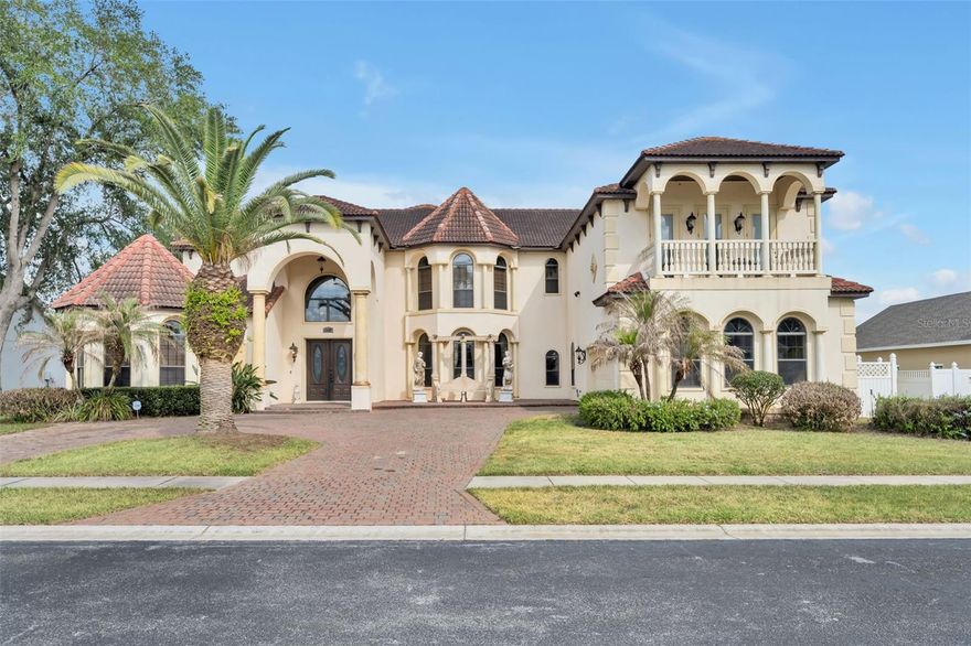 Exquisite Lakefront Luxury Estate in Formosa Gardens on Star Lake

Welcome to an extraordinary, turnkey Mediterranean estate perfectly positioned on the shores of Star Lake in the Formosa Gardens community. Just minutes from Walt Disney World, Universal Studios Florida, and SeaWorld Orlando, this remarkable residence offers the ultimate blend of luxury, comfort, and convenience.

This custom-built, lavishly furnished home features 9 spacious bedrooms and 10 bathrooms, each bedroom designed as a private suite with its own beautifully appointed bath. From the moment you enter, you are greeted by a grand staircase and elegant architectural details that set the tone for this impressive estate—perfectly suited for luxury living, corporate retreats, or large family gatherings.

At the heart of the home is a chef-inspired gourmet kitchen complete with a gas stove, granite countertops, and custom cabinetry, seamlessly flowing into expansive living and entertaining spaces. The home is thoughtfully equipped with high-end amenities including a baby grand piano, upgraded smart TVs, a private fitness area, arcade game, slate pool table, projection theater setup, and a dedicated wine room.

Step outside to your private resort-style oasis where an infinity-edge pool appears to merge into the tranquil waters of Star Lake. The screened lanai and second-floor deck provide breathtaking, unobstructed views—perfect for enjoying Florida sunsets and even Disney fireworks in the distance. Outdoor living is elevated with a fully equipped summer kitchen, gas grill, bar area, and lounge spaces designed for entertaining day or night.

With its unmatched location, exceptional design, and extensive amenities, this one-of-a-kind lakefront estate offers a rare opportunity to own a true Central Florida luxury retreat.

Experience it in person—this is a home that must be seen to be fully appreciated