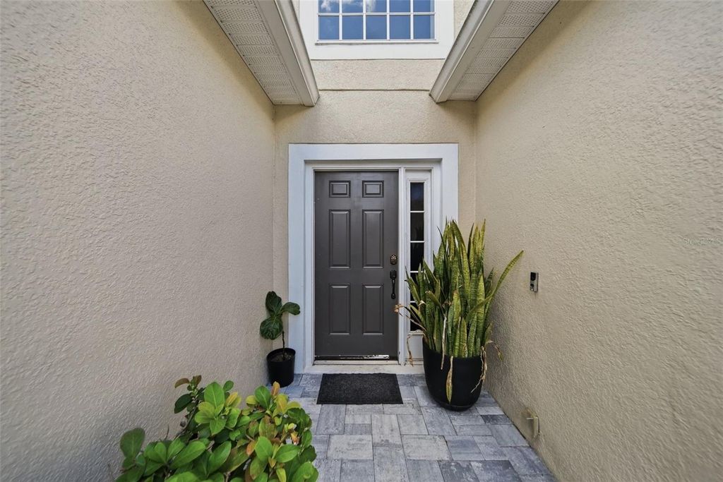Photo of 13425 Early Frost Circle, Orlando, FL 32828 (MLS # O6403548)