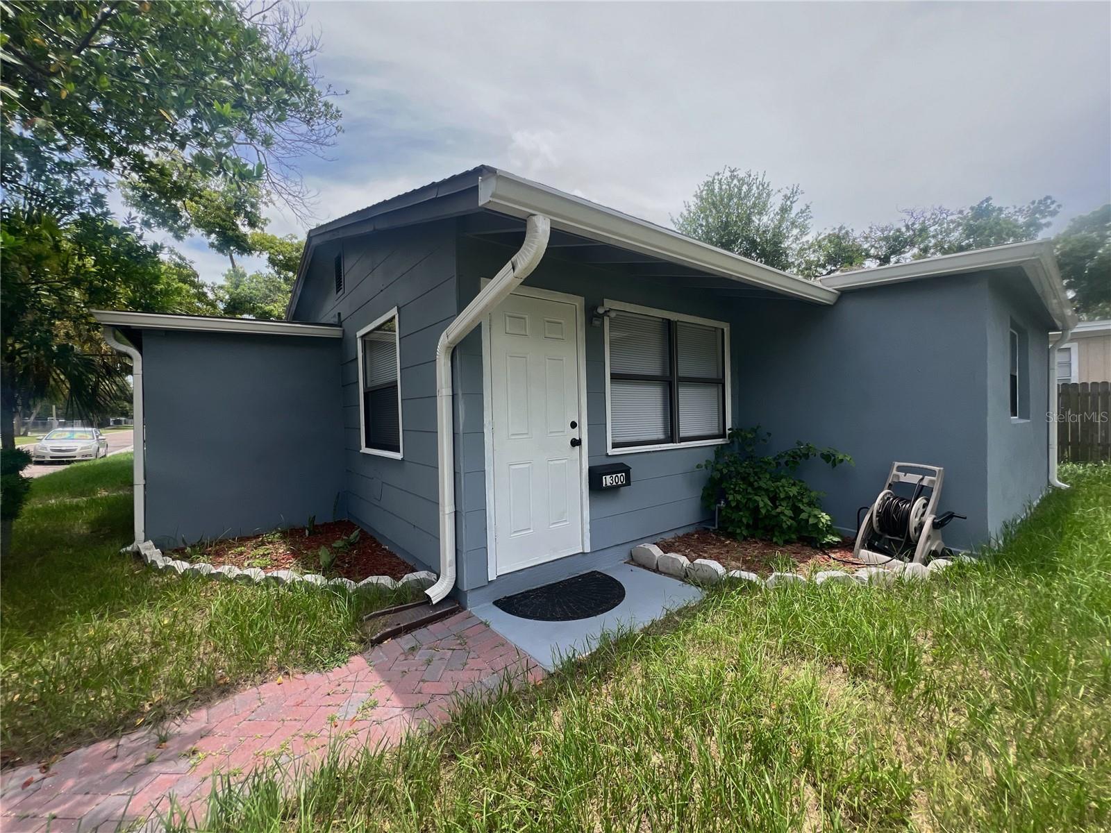Priced to sell—bring your offers! Affordable, fully renovated first home or 10%+ CAP RATE addition to an investment portfolio. No flood zone. Welcome to this beautifully updated, affordable 3-bedroom, 1-bathroom home, offering a perfect blend of work life balance, with modern upgrades and a prime location. Fully renovated in 2025, this move-in-ready home features brand-new luxury vinyl plank flooring, fresh interior and exterior paint, and a newly sodded front and back yard with an automatic irrigation system. Other upgrades include a new AC installed in 2024, a modern kitchen and bathroom updated in 2021, new water heater in 2021, fully fenced backyard completed in 2021, and a roll-out patio awning added in 2024. The backyard offers privacy and a peaceful retreat with its freshly painted fence in 2025.
This property is also zoned for an accessory dwelling unit (ADU); buyers are encouraged to do their due diligence with the city to confirm specific requirements, limitations, and development options.
The location is ideal—less than 15 minutes to both St. Pete Beach and Downtown St. Pete. It sits directly across from Douglas L. Jamerson Magnet Elementary School and is just steps from the Pinellas Trail. No flood zone. A fantastic opportunity for homeowners and investors alike.