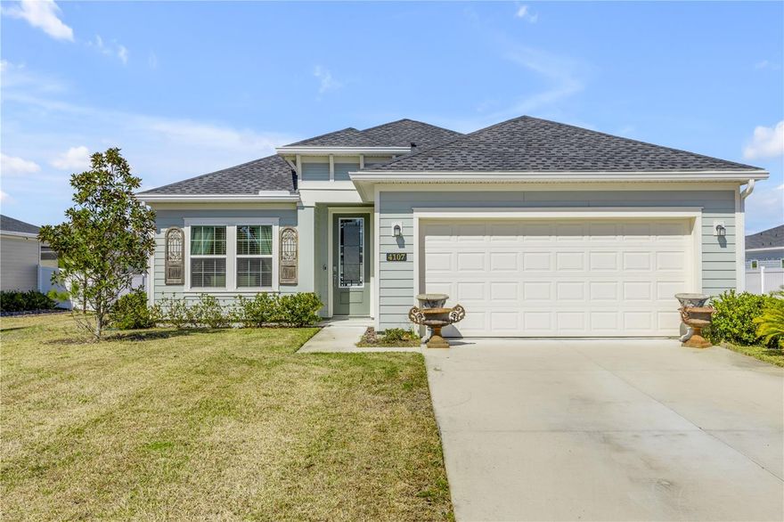 Welcome to this stunning single-family home in the desirable Wexford Reserve community of Ormond Beach, FL. Boasting 3 bedrooms and 2 bathrooms across 1,673 square feet, this home offers a perfect blend of comfort and style. Step inside to an inviting open floorplan where the kitchen, living room, and dining area flow seamlessly together. Beautiful tile flooring extends throughout the main living spaces, while plush carpet in the bedrooms adds warmth and comfort. The kitchen is a chef’s dream, featuring a center island and all stainless steel appliances, perfect for preparing meals or entertaining guests. The living and dining area is enhanced by a large three-panel sliding glass door that opens to a covered, screened lanai—ideal for enjoying Florida’s sunshine or relaxing evenings outdoors. The primary bedroom is a private retreat, complete with a walk-in closet and an en suite bathroom with dual sinks and a walk-in shower. The split bedroom layout provides privacy and flexibility for family, guests, or a home office. Outside, the spacious backyard offers plenty of room for outdoor activities or gardening. Located just minutes from the coast, popular beaches, shopping, grocery stores, and golf courses, with easy access to I-95, this home combines convenience with lifestyle. Whether hosting gatherings, enjoying quiet family time, or exploring the surrounding area, this Ormond Beach home offers an exceptional living experience in a prime location. Mortgage savings may be available for buyers of this listing.