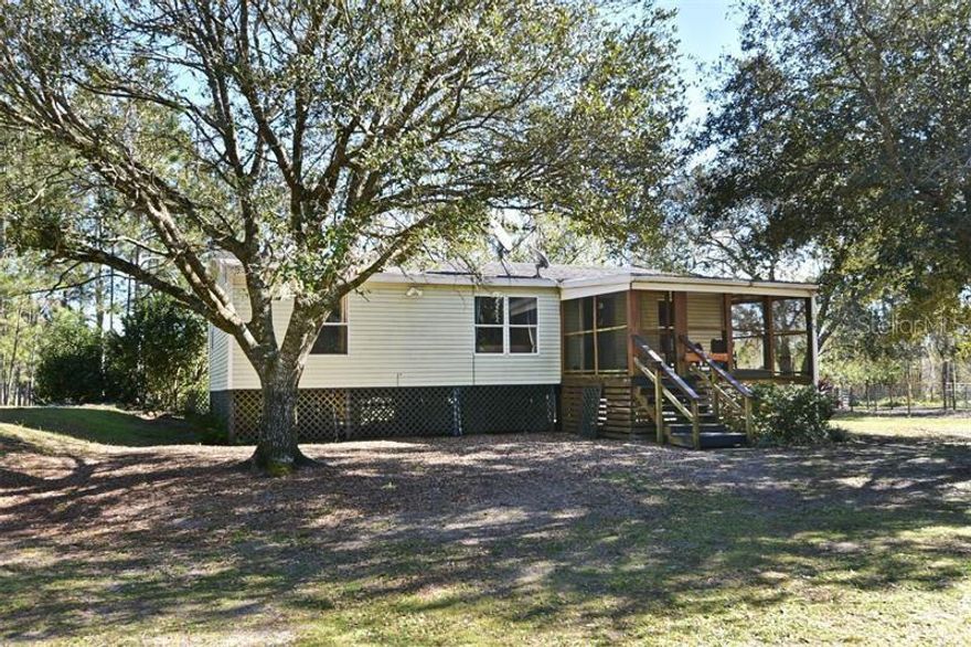 Needs TLC! 3 Bed / 2 Bath home on 11.79 acres. 3 stall barn with feed and tack rooms, equipped with water and electric! Property is fenced in. Located in Lake Harney Woods, with private community boat launch to the St. Johns. Plenty of room for your boat, ATV's and RV's!