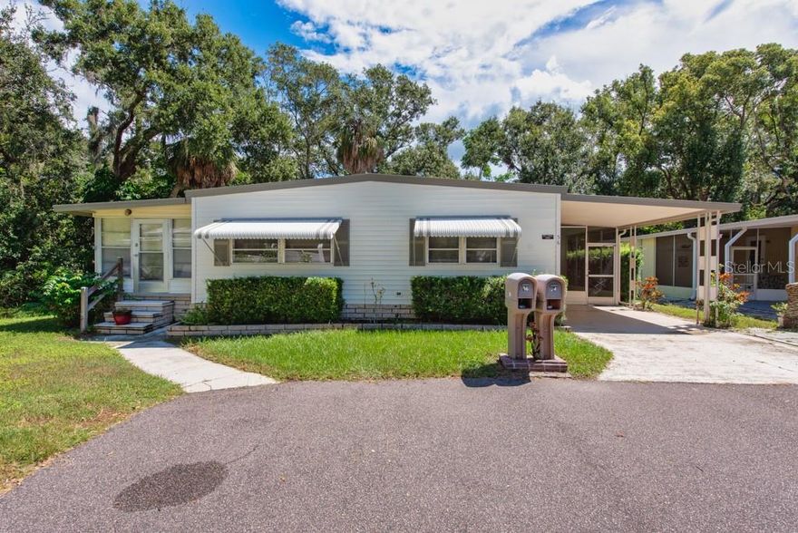 Settle into comfort and convenience with this beautifully maintained 2-bedroom, 2-bath manufactured home in the sought-after Briar Creek community of Safety Harbor. Offering 1,120 sq ft of fully furnished living space, this home blends thoughtful updates with a warm, welcoming atmosphere. Inside, you’ll find laminate flooring throughout the living areas and bedrooms, complemented by tile flooring in the kitchen for easy maintenance. An inviting large sunroom provides the perfect spot for relaxing or entertaining, while the spacious laundry room offers abundant storage. Every detail has been cared for, leaving the home in move-in-ready condition—simply bring your bags and start enjoying. What truly sets this home apart is its private setting backing up to a peaceful creek—no rear neighbors, just nature as your backdrop. Located at the end of a quiet dead-end street, this property offers rare privacy while still being part of a vibrant, active community. Plus, being situated at one of the highest points in the neighborhood means added peace of mind during hurricane season. Briar Creek is a charming 55+ neighborhood with tree-lined streets and resort-style amenities. Residents enjoy a clubhouse, heated pool and spa, shuffleboard courts, and endless activities that bring neighbors together. Essential services such as water, sewer, trash, lawn care, and road maintenance are all included, ensuring worry-free living. The location is unmatched: just minutes to downtown Safety Harbor’s shops and dining, a short drive to world-famous Gulf beaches, and close to Tampa and St. Petersburg for sports, culture, and entertainment. This is more than a home—it’s an opportunity to live the lifestyle you’ve been waiting for, all at a great value.