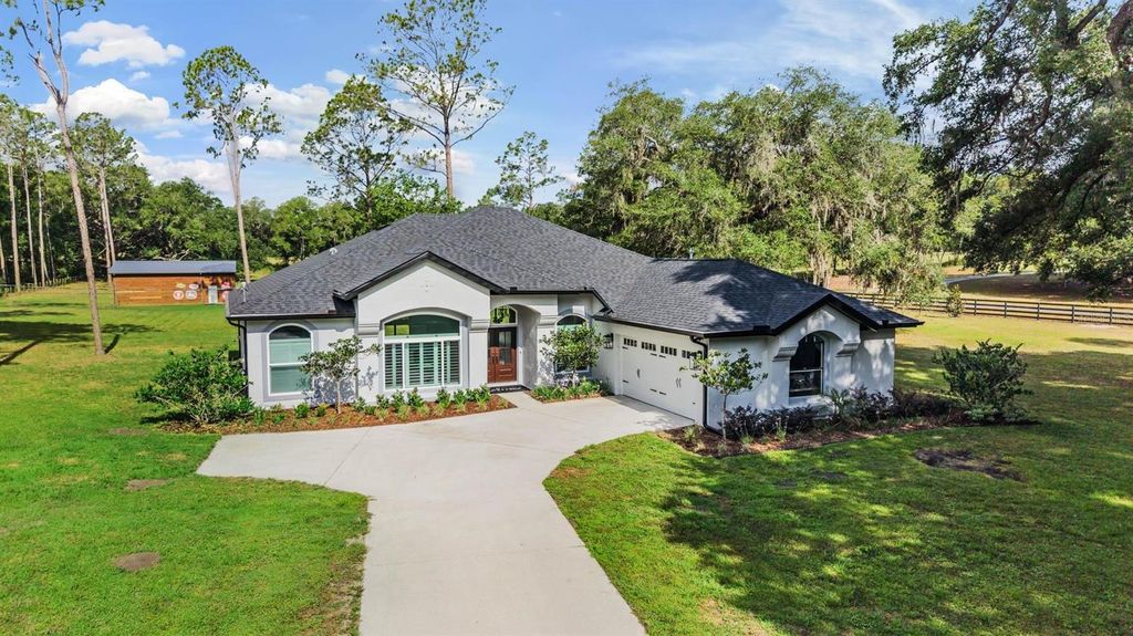 Photo of 17833 Hyland Lane, Dade City, FL 33523 (MLS # TB8504204)