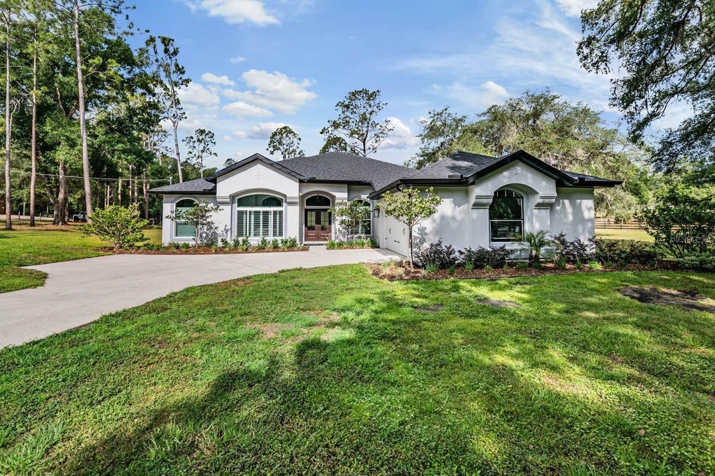 Photo of 17833 Hyland Lane, Dade City, FL 33523 (MLS # TB8504204)