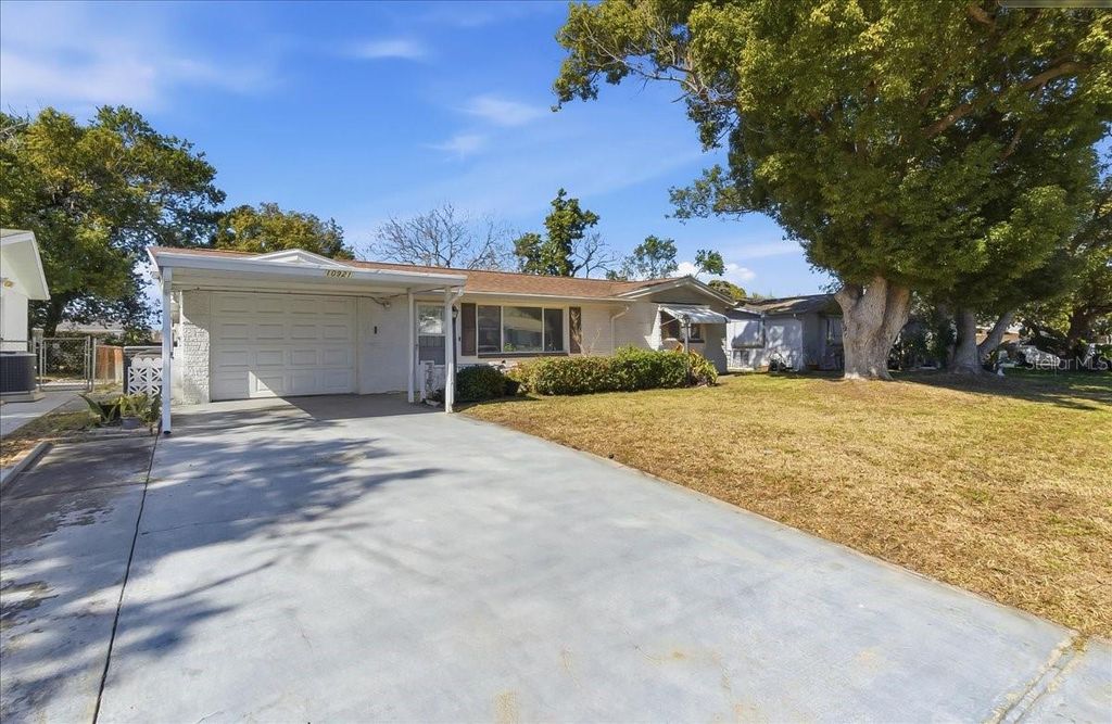 Photo of 10921 Manchester Road, Port Richey, FL 34668 (MLS # A4681282)