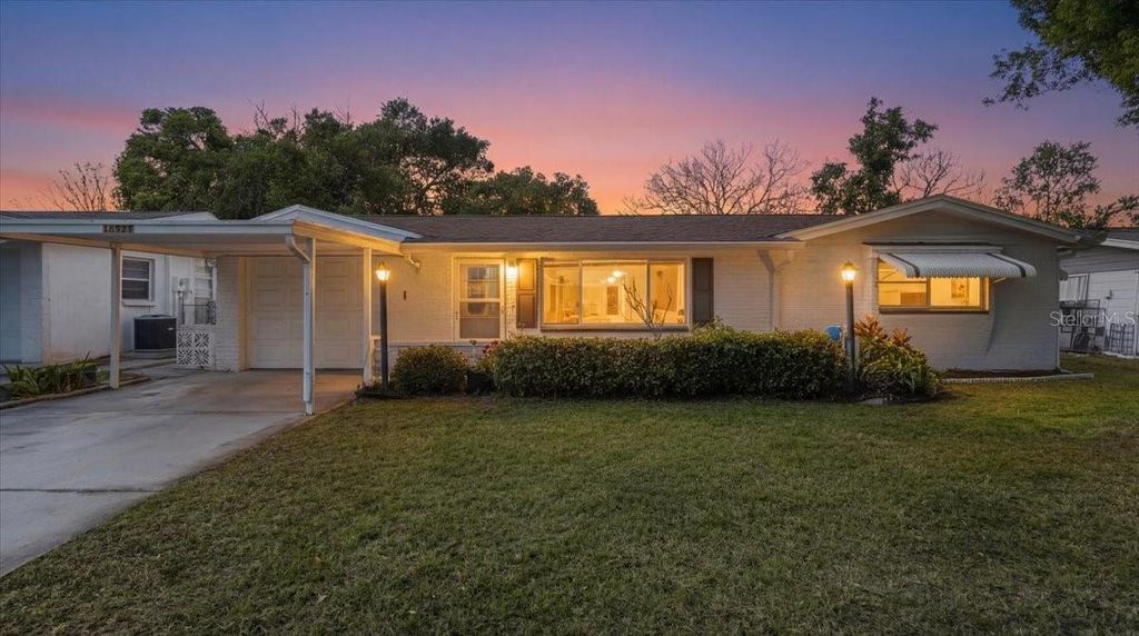 Photo of 10921 Manchester Road, Port Richey, FL 34668 (MLS # A4681282)