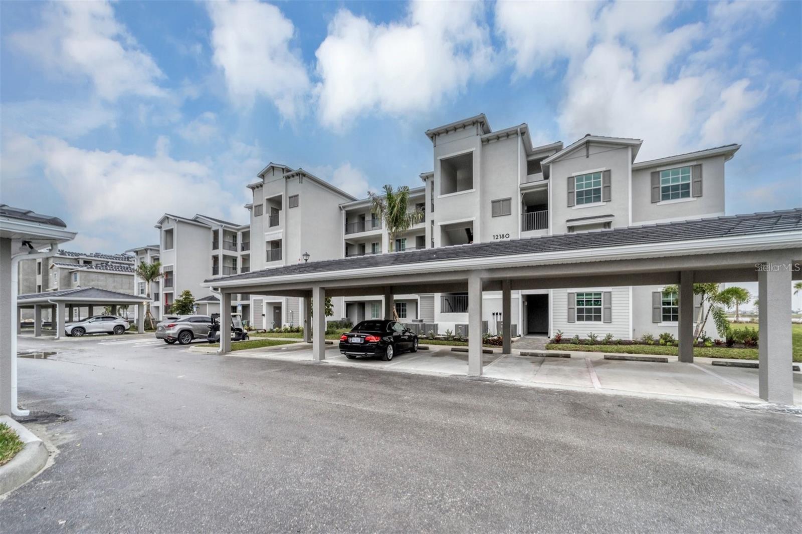 AVAILABLE FOR IMMEDIATE OCCUPANCY! Welcome to Wellen Golf & Country Club! This BRAND NEW Terrace condominium is conveniently located on the second floor, close to one of the building's 2 elevators and stairwells and directly across from your additional storage closet. Enjoy beautiful golf course views views while relaxing in this homes screened in lanai. The Arbor floor plan combines totally open living space with a split bedroom set up to provide privacy for owners and guests. This home features quartz countertops and solid wood cabinetry, large primary and guests bedrooms, 2 FULL bathrooms and oversized ceramic tile throughout. Best of all, to put your mind at ease, this unit offers IMPACT GLASS AND SLIDER! No unsightly hurricane shutter hardware or installation headaches. WELLEN Park Golf & Country Club is the only golf community within Wellen Park. Brilliantly designed by Gordon Lewis, the course is challenging and provides multiple tee boxes for golfers of every ability level. The HOA fee includes TWO GOLF MEMBERSHIPS, cable/internet, water/sewer, exterior building & grounds maintenance, guard protected front gate and access to all the incredible future amenities that are already under construction. Community amenities include a resort style pool and tiki bar, satellite neighborhood pools, restaurant, dayspa, racquet courts, bocce, yoga & fitness pavilion, dog park, concert lawn and MORE!