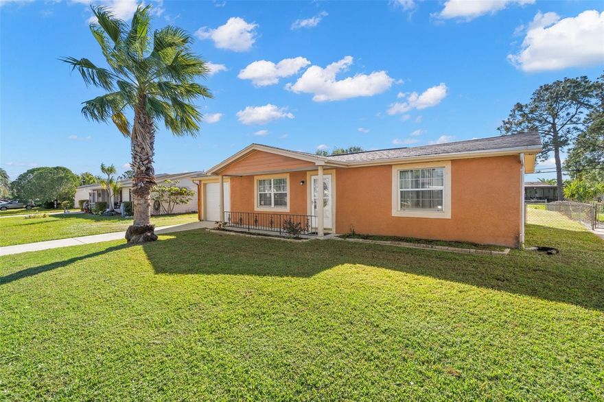 Move-in ready home for you in a quiet neighborhood, but very close to shopping and easy to commute. Nicely updated and very little lived in by the owner, who was coming only for a couple of months in winter time. Roof and windows and entry door were replaced in 2015. All floors are tiled, kitchen has nice wooden cabinets, like new appliances, and washer and dryer in the garage. Furniture is negotiable. A good size enclosed back porch gives you place to relax and a very large back yard with chain link fence all around. Nice curb appeal and all rooms of good size. Owner recently installed additional insulation, for energy efficiency. This is a great opportunity for a first time buyer to enjoy homeownership.