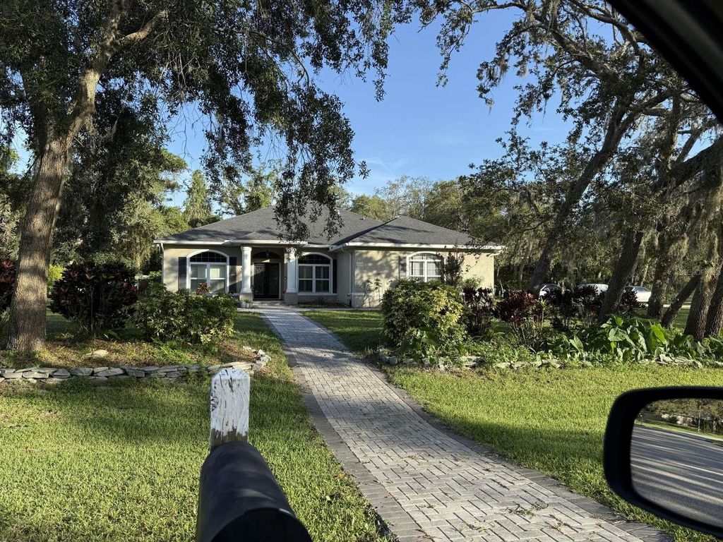 Photo of 6568 Millstone Drive, New Port Richey, FL 34655 (MLS # TB8412158)