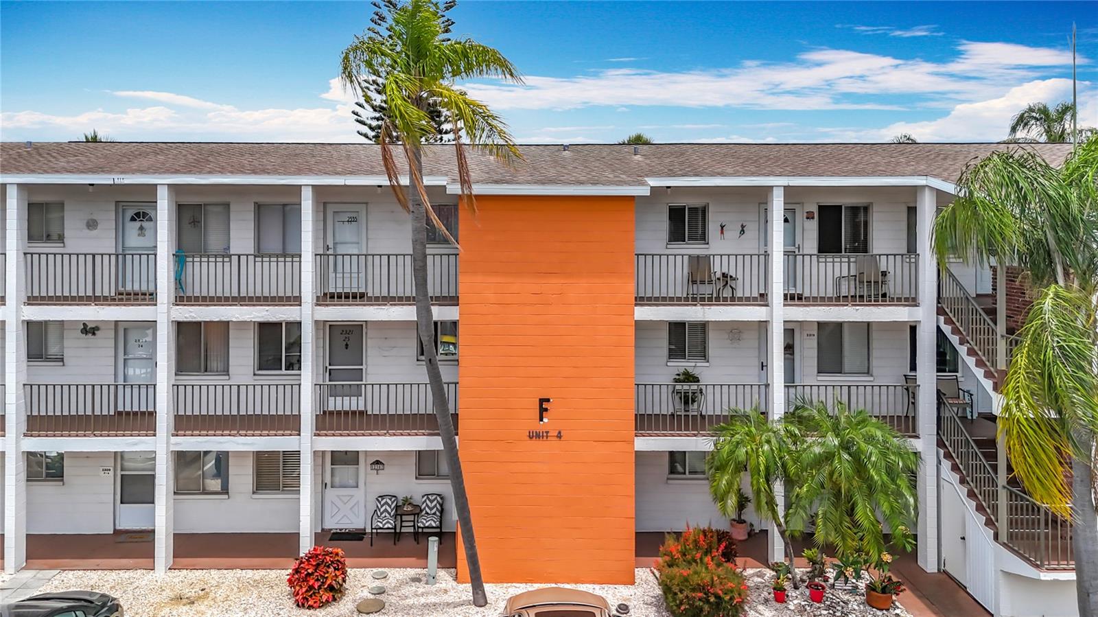 Whether you're looking for a cozy snowbird retreat or a full-time residence—this is the one! Located in the 55+ community of Fourth Bayshore Gardens Condominiums with maintenance provided and amenities galore, this second-floor one-bedroom condo comes with an updated kitchen with real wood cabinetry and a sleek tile backsplash. Best of all, the neutral tile floors throughout would go perfectly with any décor. If you're looking for a ‘community,’ look no further. With a full calendar of social clubs, activities, and potluck dinners, you can be fast friends with your neighbors in no time. This unit is situated perfectly within the community. The clubhouse, shuffleboard courts, bocce courts, heated pool, grill areas, laundry facilities, and a beautifully landscaped courtyard (perfect for morning walks) are mere steps away but without all the hustle and bustle in your backyard. Instead, the rear balcony overlooks green space, creating a beautiful and serene private setting. As they say, location, location, location, and this location can't be beat. Bradenton Beach and its sugary sand is only 15 minutes away, Sarasota-Bradenton International Airport is only 10 minutes away, and every imaginable shopping and dining destination is usually right around the corner…some even within walking distance (including a Target, Publix, and library). With that, and having multiple bus stops right outside the community means ‘no car’ is ‘no problem.’ However, each unit comes with nearby assigned parking, and there’s plenty of guest parking. For owner convenience, there are also elevators (recently renovated) and secure exterior storage closets for beach gear, bikes, etc. Storage is also no problem thanks to dual closets in the bedroom (including a 6ft long bar AND 3'x2' shelves), a 3'x2' closet in the hall, and another 3'x2' storage closet right outside your front door. (Furnishings shown can be included in the sale or removed prior to closing)