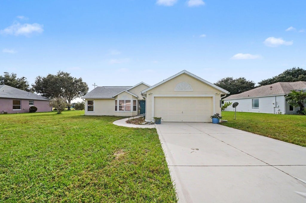 Photo of 13354 Biscayne Drive, Grand Island, FL 32735 (MLS # O6453223)