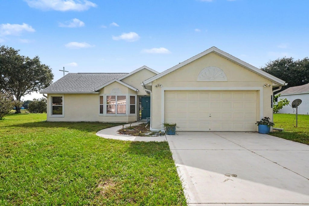 Photo of 13354 Biscayne Drive, Grand Island, FL 32735 (MLS # O6453223)
